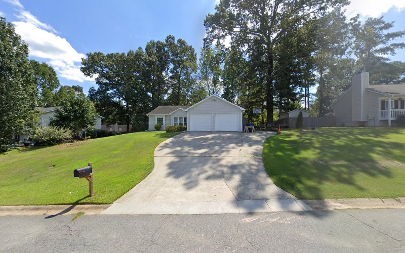 H T Roofing Inc